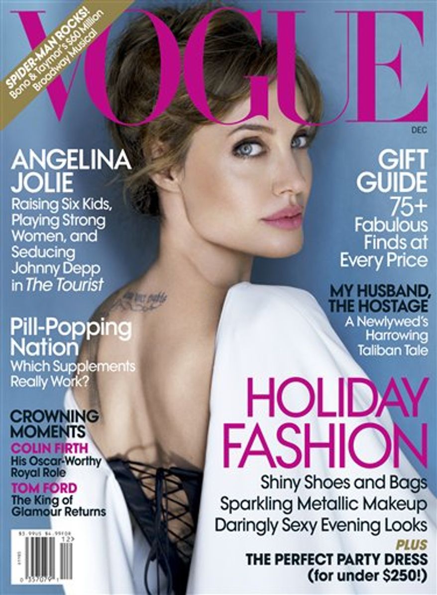 In this publicity image released by Vogue, actress Angelina Jole is shown on the December 2010 issue of "Vogue" magazine, available on newsstands on Nov. 23, 2010. (AP Photo/Vogue)