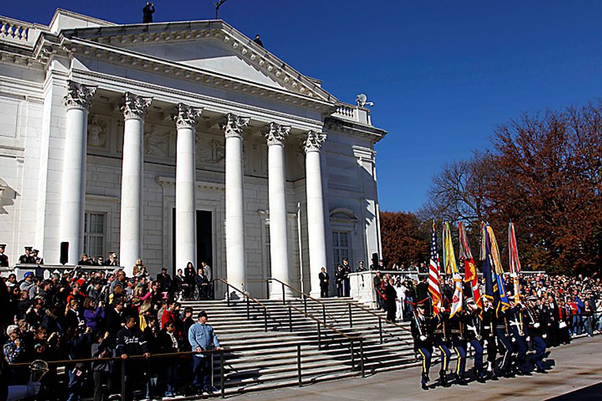 A Color Guard gets into position during the wreath ceremony at the Tomb of the Unkowns in honor of Veterans' Day,Thursday, Nov. 11, 2010, at Arlington National Cemetery in Arlington, Va. (AP Photo/Alex Brandon)