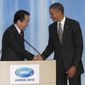 ASSOCIATED PRESS Japanese Prime Minister Naoto Kan, left, shakes hands with President Barack Obama after the leaders declaration at the APEC summit in Yokohama, Japan, Sunday, Nov. 14, 2010.