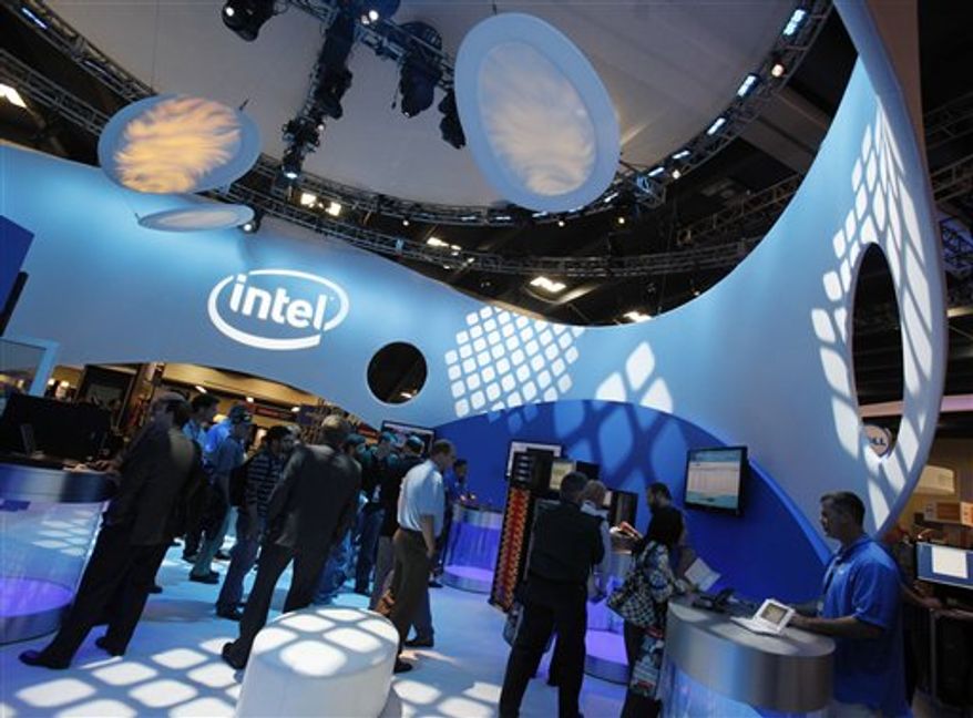 In this Sept. 22, 2010 photo, Intel Corp. CEO Paul Otellini smiles at a conference in San Francisco. In a statement Friday, Nov. 12, 2010, Otellini said the company "remains on track to have our best year ever." (AP Photo/Paul Sakuma)