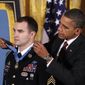 President Obama presents the Medal of Honor to Army Staff Sgt. Salvatore Giunta during a ceremony in the East Room of the White House in Washington, Tuesday, Nov. 16, 2010. Sgt. Giunta, from Hiawatha, Iowa, is the first living veteran of the wars in Iraq and Afghanistan to receive the award. (AP Photo/Charles Dharapak)