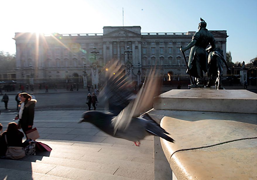 A view of Buckingham Palace in central London, Tuesday, Nov. 16, 2010. Britain's Prince William, who is second in line to the throne, and girlfriend Kate Middleton are engaged and will marry next spring or summer in London _ a royal wedding that Britons have been eagerly awaiting for years.The announcement Tuesday by royal officials ends an on-again, off-again romance that began after the two met more than eight years ago as students at the University of St. Andrews in Scotland. Prince William turned 28 in June and recently completed training a Royal Air Force search and rescue pilot.(AP Photo/Lefteris Pitarakis)