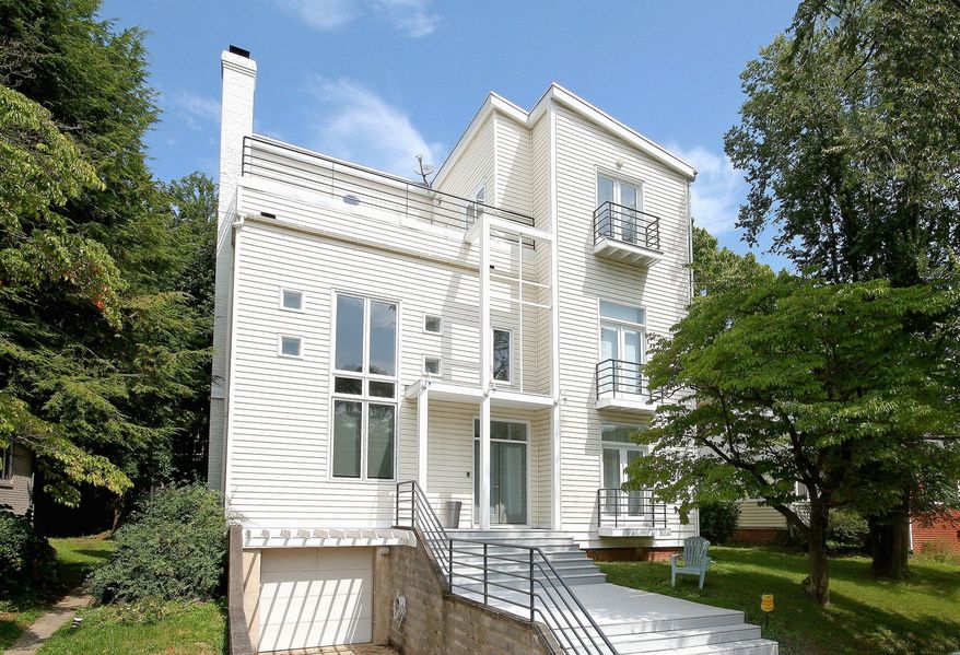 Architect Rula Jawdat transformed an ordinary rambler into a four-level contemporary home. On the market for $1,199,000, the home at 4515 Q Lane NW has five bedrooms and four full baths