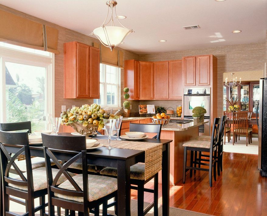 The White Oak II model at Poplar Hill Estates has a center-island kitchen with a pantry and a morning room with a glass door to the backyard. The model has 3,073 square feet and is priced from $469,900.