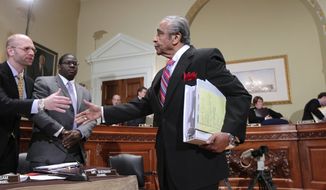 Rep. Charles Rangel, New York Democrat, right, reaches out to shake hands with Blake Chisam, chief counsel for the House Committee on Standards of Official Conduct, on Capitol Hill in Washington, Monday, Nov. 15, 2010. (AP Photo/J. Scott Applewhite)
