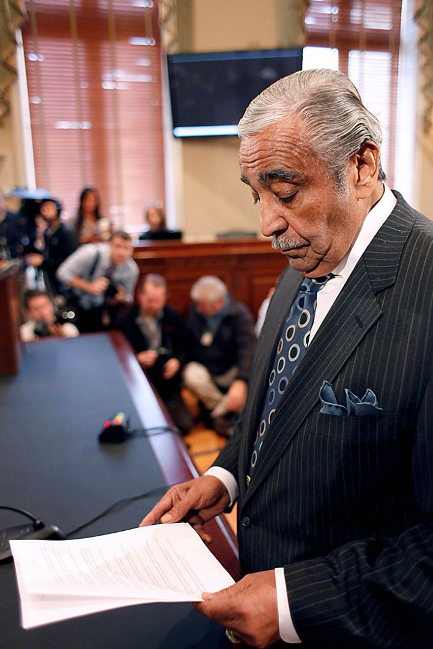 Rep. Charles Rangel, D-N.Y. goes over his notes while appearing before the House Ethics Committee, on Capitol Hill in Washington, Thursday, Nov. 18, 2010. (AP Photo/Harry Hamburg)