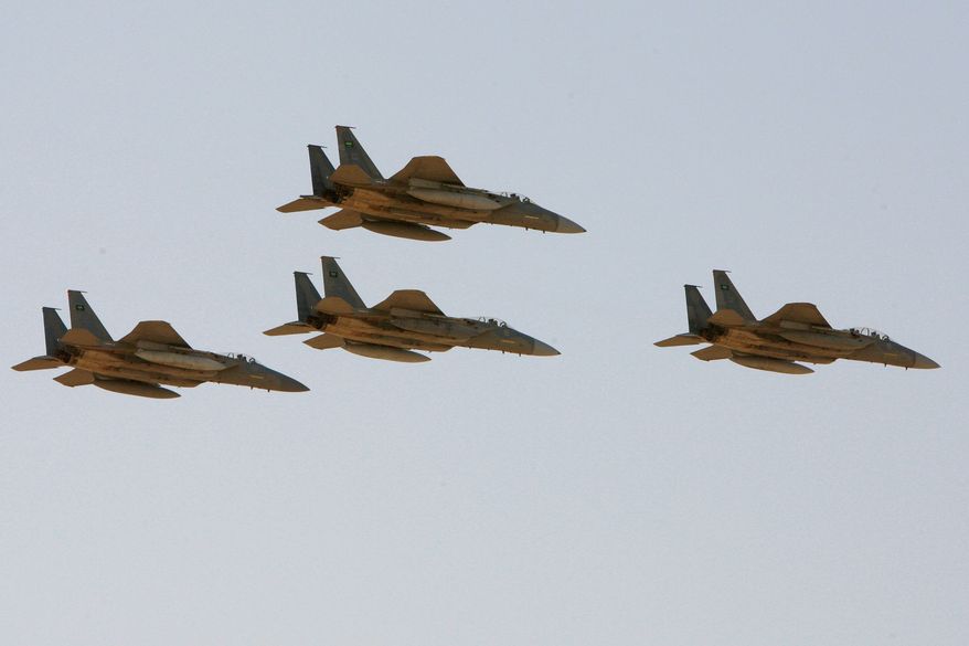 In this Sunday, Jan. 25, 2009, file photo, F-15 warplanes of the Saudi Air Force fly over the Saudi Arabian capital Riyadh during a graduation ceremony at King Faisal Air Force University. A $60 billion arms deal with Saudi Arabia was expected to be a done deal at midnight Friday, Nov. 19, 2010. (AP Photo/Hassan Ammar, File)