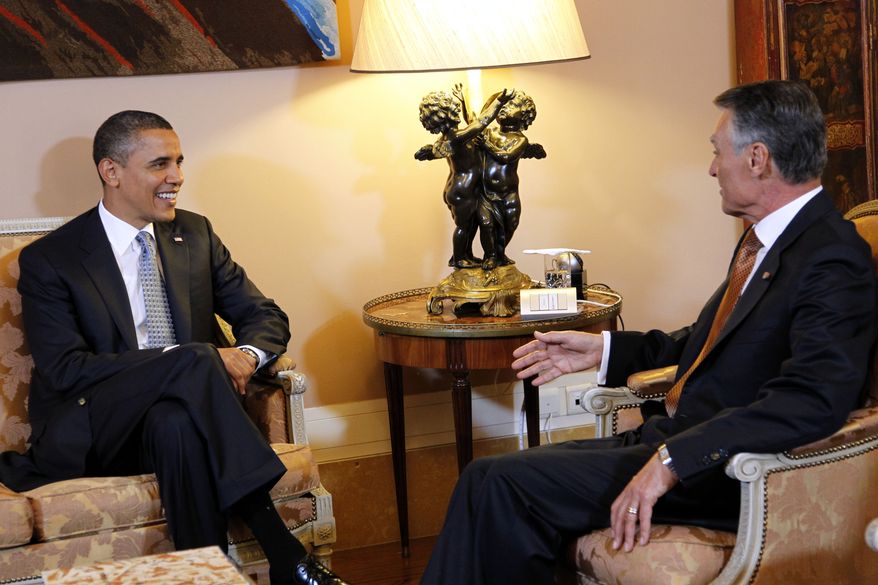 President Obama meets with Portuguese President Anibal Cavaco Silva before their bilateral meeting at the Belem National Palace in Lisbon, Portugal, Friday, Nov. 19, 2010. (AP Photo/Pablo Martinez Monsivais)