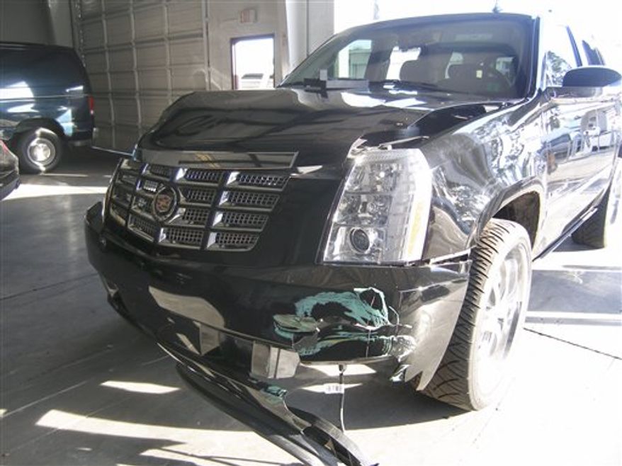 FILE - This photo taken Nov. 27, 2009, and released by the Florida Highway Patrol on Dec. 2, 2009, shows front end damage to Tigers Woods' vehicle, in Orlando, Fla. (AP Photo/Florida Highway Patrol, File)