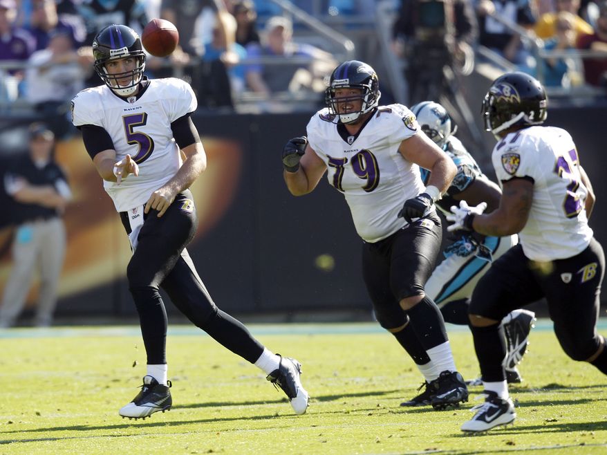 ASSOCIATED PRESS Baltimore Ravens quarterback Joe Flacco (5) throws a pass to Ray Rice (27) in the first half of an NFL football game against the Carolina Panthers in Charlotte, N.C., Sunday, Nov. 21, 2010. 