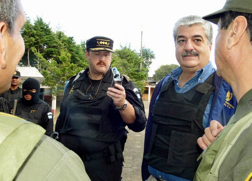 National Police Director Erwin Sperisen stands inside the Pavon prison during a government raid on the outskirts of Guatemala City. (Associated Press)
