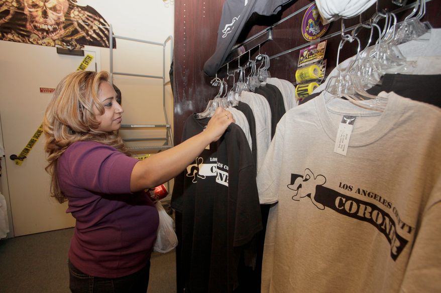 Archie Guerrero browses through merchandise inside the tongue-in-cheek little shop of horrors. Many customers hear about the store through word of mouth or tourist guidebooks. (Associated Press)