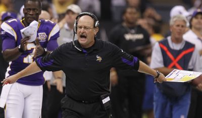ASSOCIATED PRESS FILE - This Sept. 9, 2010, file photo shows Minnesota Vikings head coach Brad Childress reacting during their NFL football game against the New Orleans Saints at the Louisiana Superdome. The Vikings fired Childress on Monday, Nov. 22, 2010, cutting ties with a head coach who had come under increasing fire from his players - and his boss - for everything from their horrid start to his 1-2 playoff record and his abrupt decisions.