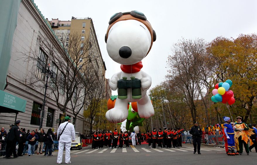 Snoopy floats above the street before the start of the Macy's Thanksgiving Day Parade in New York Thursday, Nov. 25, 2010. (AP Photo/Craig Ruttle)