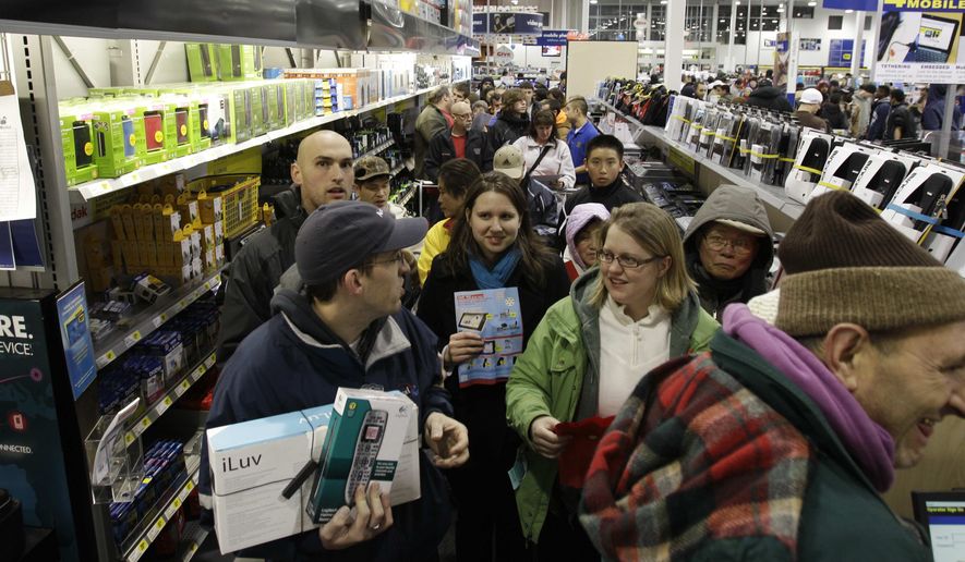 Crowds of shoppers line up to purchase computers in the early hours of &quot;Black Friday,&quot; Nov. 26, 2010, at Best Buy in Tacoma, Wash. (AP Photo/Ted S. Warren)
