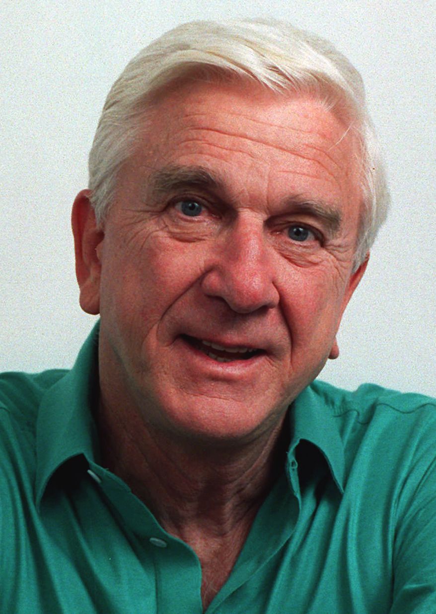 FILE - This file photo taken in November 1991, shows actor Leslie Nielsen. The Canadian-born Nielsen, who went from drama to inspired bumbling as a hapless doctor in "Airplane!" and the accident-prone detective Frank Drebin in "The Naked Gun" comedies, has died. He was 84. His agent John S. Kelly says Nielsen died Sunday, Nov. 28, 2010, at a hospital near his home in Ft. Lauderdale, Fla., where he was being treated for pneumonia. (AP Photo/Doug Pizac, file)