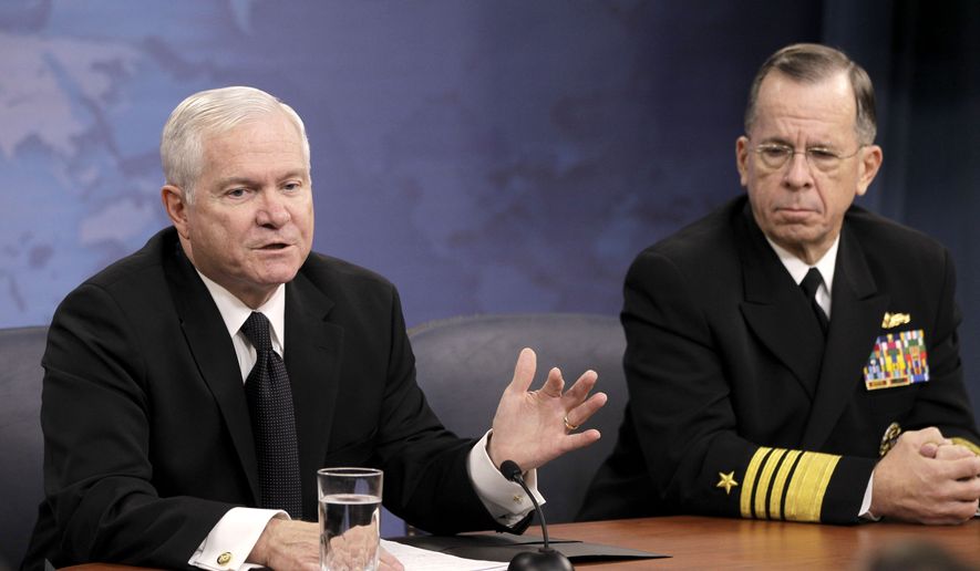 Defense Secretary Robert M. Gates and Adm. Mike Mullen, chairman of the Joint Chiefs of Staff, speak to reporters on gays in the military on Tuesday, Nov. 30, 2010, at the Pentagon. (AP Photo/Charles Dharapak)