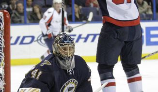 Washington Capitals&#39; Brooks Laich (21) celebrates a goal as St. Louis Blues&#39; Jaroslav Halak, of Slovakia, reacts in the first period of an NHL hockey game, Wednesday, Dec. 1, 2010 in St. Louis. (AP Photo/Tom Gannam)
