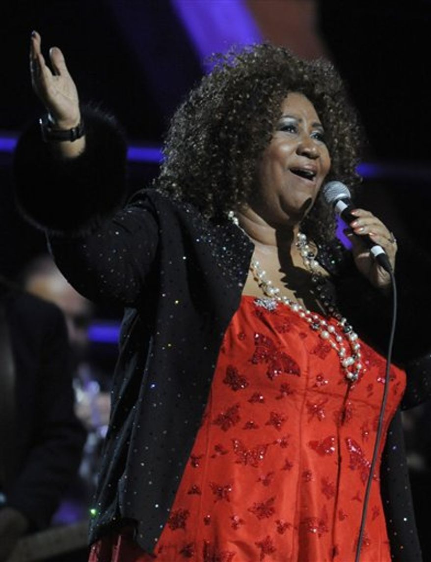FILE - In this Oct. 30, 2009 file photo, Aretha Franklin performs at the 25th Anniversary Rock & Roll Hall of Fame concert at Madison Square Garden in New York. A community prayer vigil was held in Detroit for Aretha Franklin on Wednesday, Dec. 1, 2010, a day before organizers say the singing legend is to undergo a medical procedure. (AP Photo/Henny Ray Abrams, File)