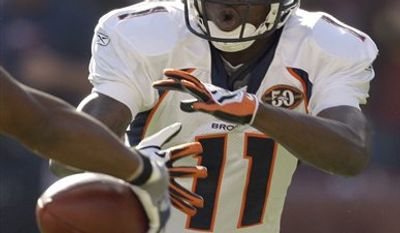 FILE - This July 29, 2009, file photo shows Denver Broncos wide receiver Kenny McKinley stretching before drills at the team's training camp in Englewood, Colo. McKinley reportedly had a gambling problem and was deep in debt when he committed suicide on Sept. 21, according to a sheriff's department investigative report Wednesday Dec. 1, 2010. (AP Photo/David Zalubowski, File)