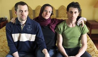 ** FILE ** American hikers Shane Bauer (left), Sarah Shourd and Josh Fattal are pictured at the Esteghlal Hotel in Tehran in May 2010. (AP Photo/Press TV, File)