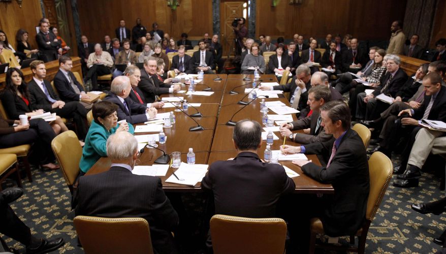The Commission on Fiscal Responsibility and Reform meets on Capitol Hill in Washington on Friday, Dec. 3, 2010. (AP Photo/Harry Hamburg)