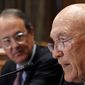 ** FILE ** In this Nov. 10, 2010, file photo, Erskine Bowles, left, watches former Wyoming Sen. Alan Simpson, co-chairman of President Barack Obama&#39;s bipartisan deficit commission, speak at a news conference on Capitol Hill in Washington. (AP Photo/Alex Brandon, File)