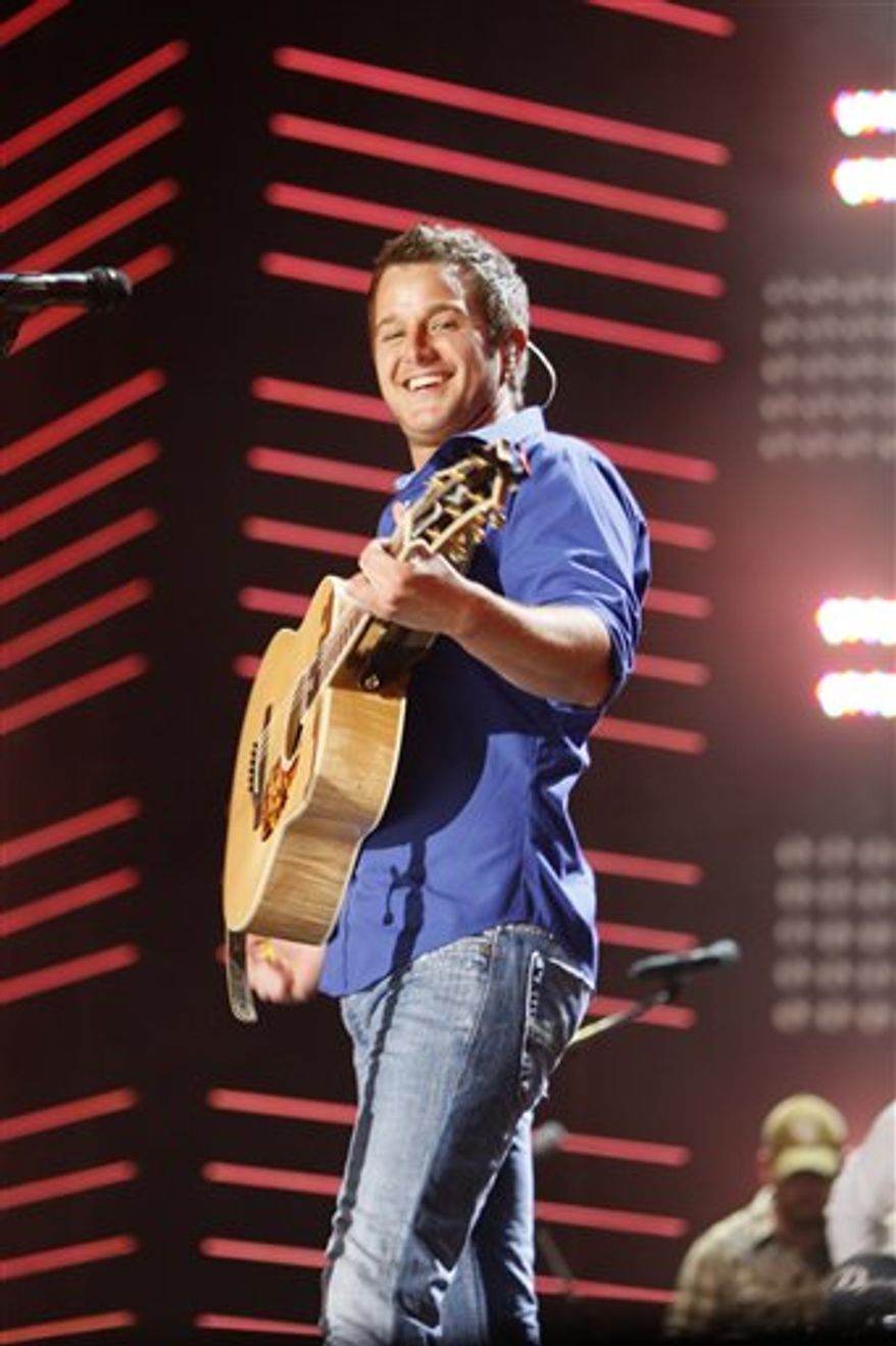 FILE - In this June 12, 2010 file photo, Easton Corbin performs during the CMA Music Festival in Nashville, Tenn. (AP Photo/Wade Payne, file)