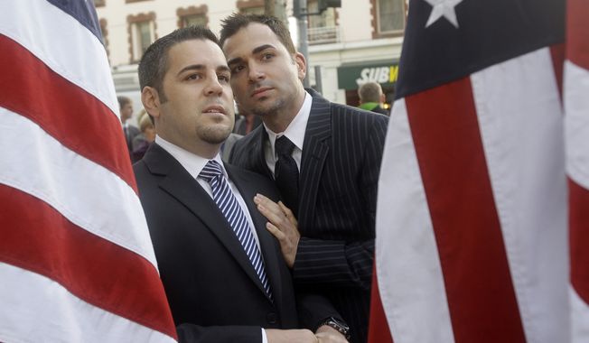 ** FILE ** Jeffrey Zarrillo (left) and Paul Katami, plaintiffs in the Proposition 8 gay-marriage case, are seen outside the federal courthouse before a hearing in the 9th U.S. Circuit Court of Appeals on Monday, Dec. 6, 2010, in San Francisco. (AP Photo/Jeff Chiu)