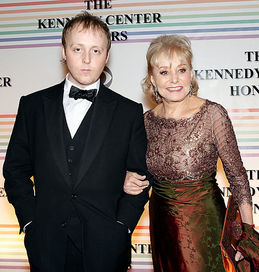 James McCartney, left, son of Paul McCartney, and Barbara Walters walk the red carpet at the Kennedy Center Honors in Washington, on Sunday, Dec. 5, 2010. The 2010 honorees were Merle Haggard, Jerry Herman, Bill T. Jones, Mr. McCartney and Oprah Winfrey. (AP Photo/Jacquelyn Martin)