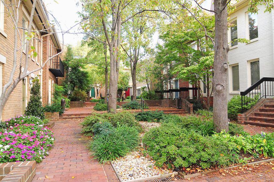 The home at 4319 Embassy Park Drive NW faces the courtyard and has a private flagstone patio. The home, on the market for $749,000, has two bedrooms, three full baths and a powder room.