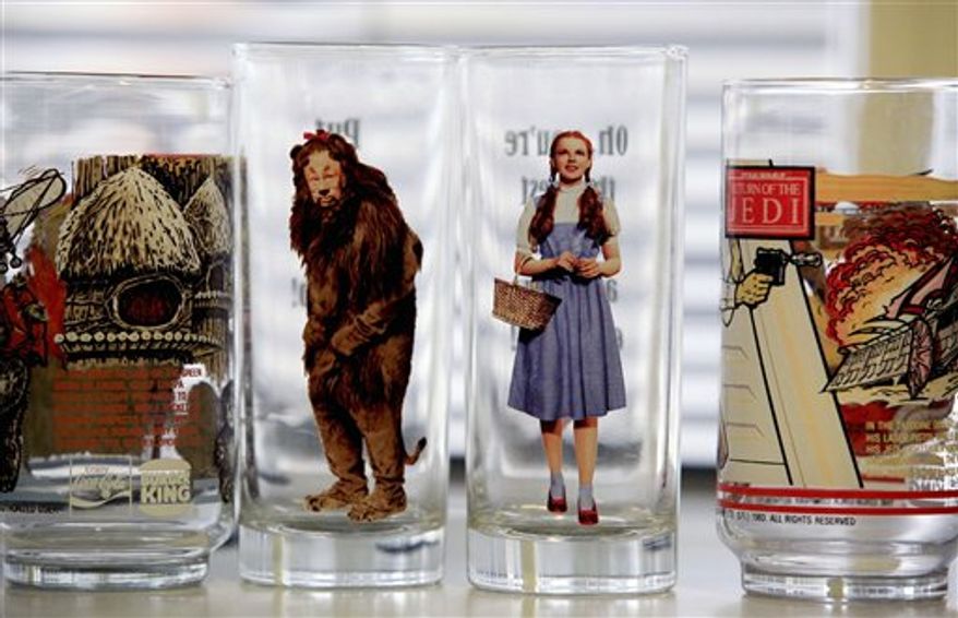 EDS: CORRECTS AGENCY NAME -- FILE - In this Sept. 9, 2010 file photo, glasses with characters from "Return of the Jedi" and "The Wizard of Oz" are seen during a test for cadmium, lead and other toxic elements in Los Angeles. The federal agency that declared lead-laced Wizard of Oz and superhero drinking glasses were children's products has reversed itself and said the glasses are, in fact, for adults. The Consumer Product Safety Commission says that as a result the glasses are not subject to a recall previously announced by their importer. (AP Photo/Richard Vogel, File)