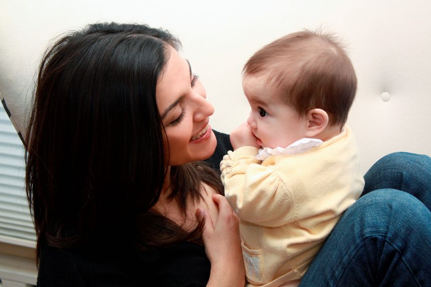 Associated Press
Rachel Campos-Duffy, wife of Rep.-elect Sean Duffy, Wisconsin Republican, holds daughter Paloma in February 2009.