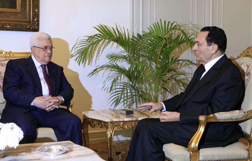 ** FILE ** Egyptian President Hosni Mubarak (right) meets with Palestinian Authority President Mahmoud Abbas at the presidential palace in Cairo on Thursday, Dec. 9, 2010. The talks came within the framework of efforts to revive the Middle East peace process. (AP Photo/Amr Nabil)