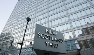 British police, headquartered at New Scotland Yard in London, on Monday arrested a dozen men suspected of plotting a large-scale terror attack. (AP Photo)