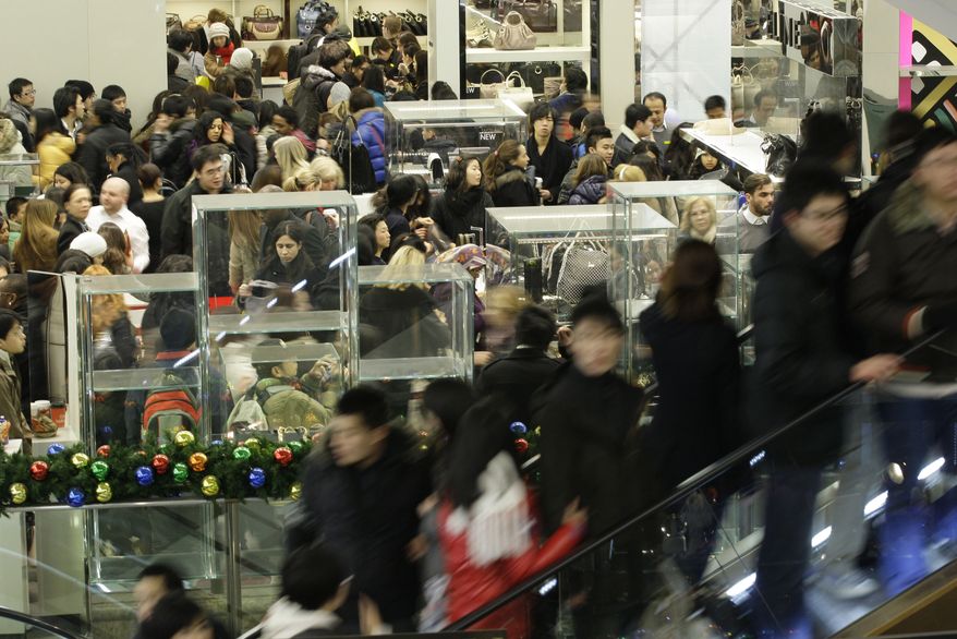 British shoppers get a head start on their American cousins at Selfridges department store in London on the first day of post-Christmas sales on Sunday, Dec. 26, 2010. Retailers are hoping for a Boxing Day bonanza as they slash prices in a bid to entice prospective customers into their stores. (AP Photo/Sang Tan)