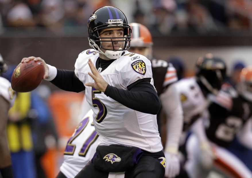 Baltimore Ravens quarterback Joe Flacco (5) looks to throw against the Cleveland Browns during first-quarter NFL football game action on Sunday, Dec. 26, 2010, in Cleveland. (AP Photo/Tony Dejak)