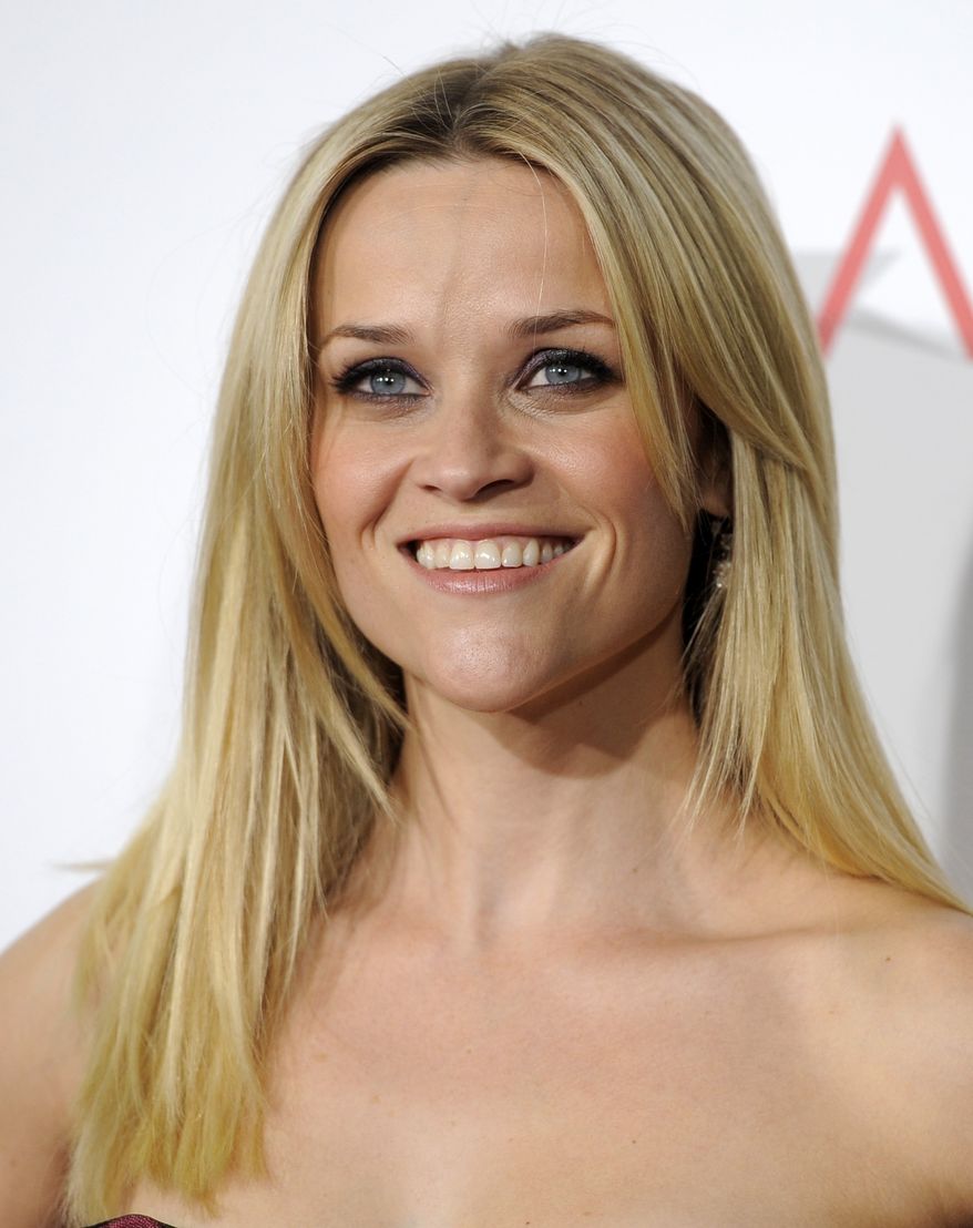 ** FILE ** In this Dec. 13, 2010, file photo, Reese Witherspoon arrives at the premiere of the film "How Do You Know" in Los Angeles. A representative for Witherspoon confirmed on Tuesday, Dec. 28, 2010, that Witherspoon is engaged to Hollywood agent Jim Toth. (AP Photo/Chris Pizzello, File)