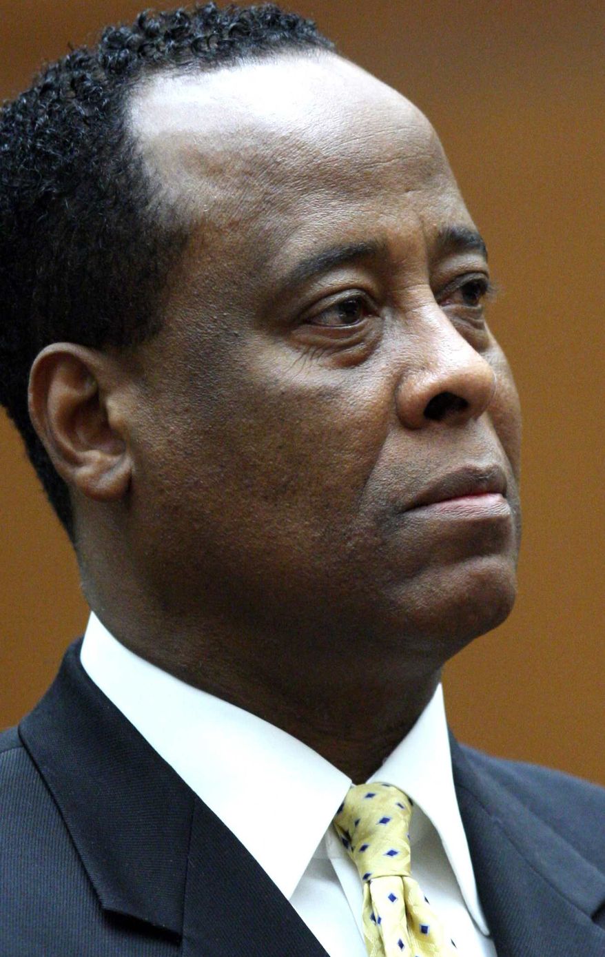 ** FILE ** Dr. Conrad Murray appears at a procedural hearing in Los Angeles in April 2010. (AP Photo/David McNew, Pool, File)