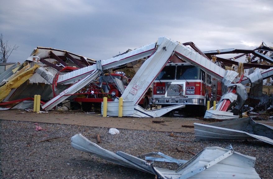 The station for the Cincinnati, Ark., volunteer fire department was destroyed shortly after 6 a.m. Friday, Dec. 31, 2010, when an apparent tornado swept across the rural, unincorporated community that's west of Fayetteville, Ark. Three people died when a nearby home and barn were destroyed by the storm. (AP Photo/Washington County Enterprise-Leader, Northwest Arkansas Times, Rod Russell)