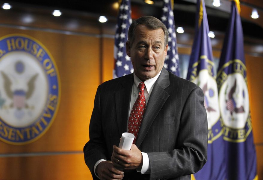 ** FILE ** In this Dec. 17, 2010, file photo, House Speaker-designate John Boehner, Ohio Republican, talks with media on Capitol Hill in Washington. Two early showdowns on spending and debt will signal whether the 112th Congress can find common ground despite its partisan divisions, or whether it's destined for gridlock and brinkmanship that could threaten the nation's economic health. (AP Photo/Alex Brandon, File)