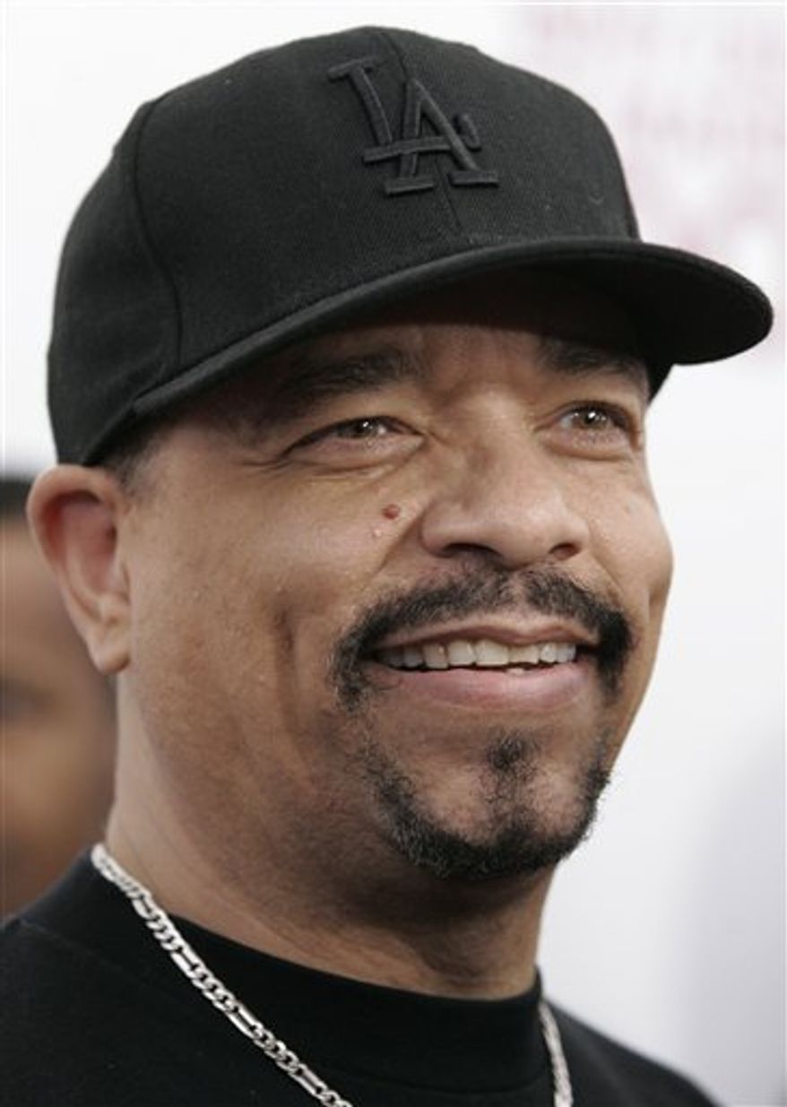 FILE - In this file photo, Ice-T arrives for the Special Screening of Tyler Perry's 'Why Did I Get Married Too?', Monday, March 22, 2010 in New York. Hungary's media authority says it is investigating a radio station for playing Ice-T songs with explicit lyrics, an announcement that got an enthusiastic response from the hip-hop star and actor. The Ice-T songs "Warning" and "It's On" played in September of last year should have been broadcast only after 9 p.m., the National Media and Infocommications Authority said in a statement posted on its Web site Saturday. (AP Photo/Jessica Rinaldi, File)