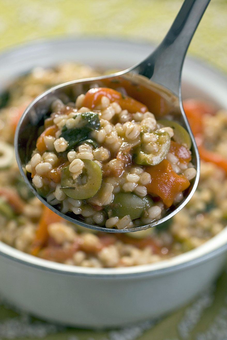 Mediterranean barley vegetable stew would appeal to vegans. Vegan food is a celebration of produce, as is this stew. (Associated Press)