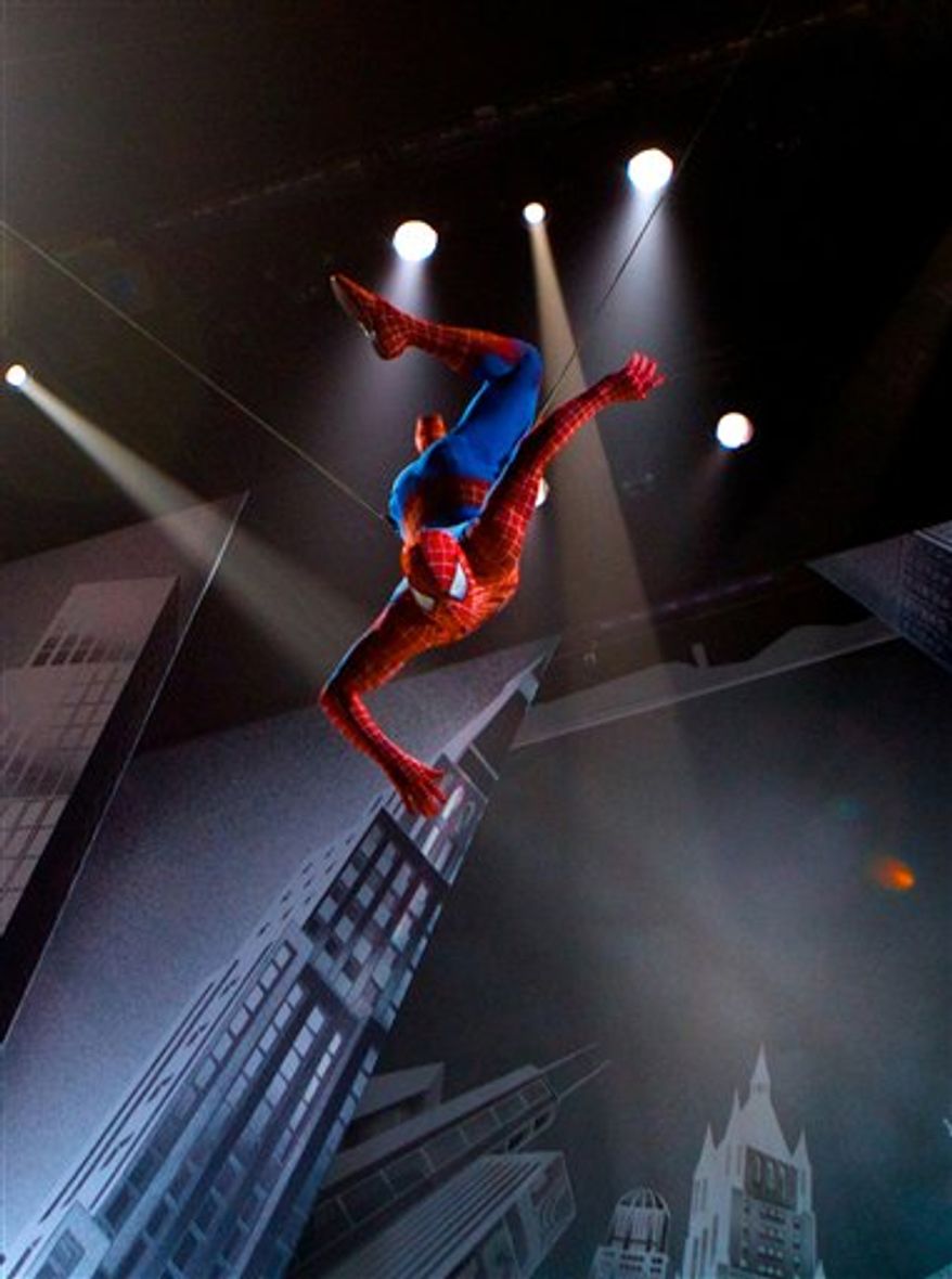 In this theater publicity image released by The O and M Co., Christopher Tierney portrays Spider-Man in a scene from the musical "Spider-Man: Turn Off the Dark," in New York. (AP Photo/The O and M Co., Jacob Cohl) NO SALES