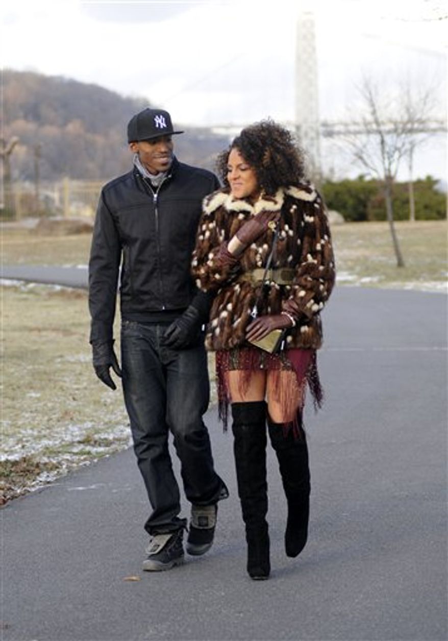 In this Dec. 15, 2010 photo released by RCA Music Group, recording artist Marsha Ambrosius is shown during the filming of her music video for "Far Away" in Edgewater, New Jersey. (AP Photo/RCA Music Group, Fernando Leon)