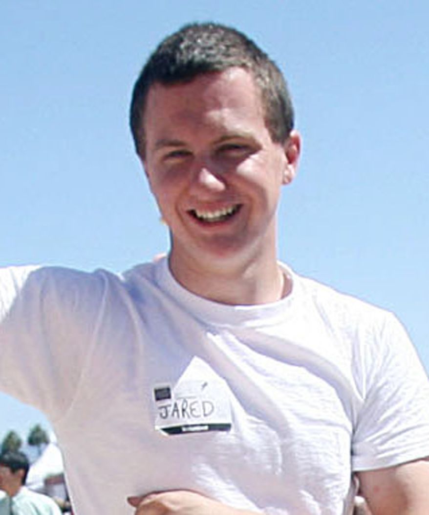 This March 2010 photo shows a man identified as Jared Loughner at the 2010 Tucson Festival of Books in Tucson, Ariz. The Arizona Daily Star, a festival sponsor, confirmed from their records that the subject's address matches one under investigation by police after a shooting in Tucson that left Rep. Gabrielle Giffords wounded and six others dead. Police say a suspect is in custody, and he was identified by people familiar with the investigation as Mr. Loughner, 22, of Tucson. (AP Photo/Arizona Daily Star, Mamta Popat)