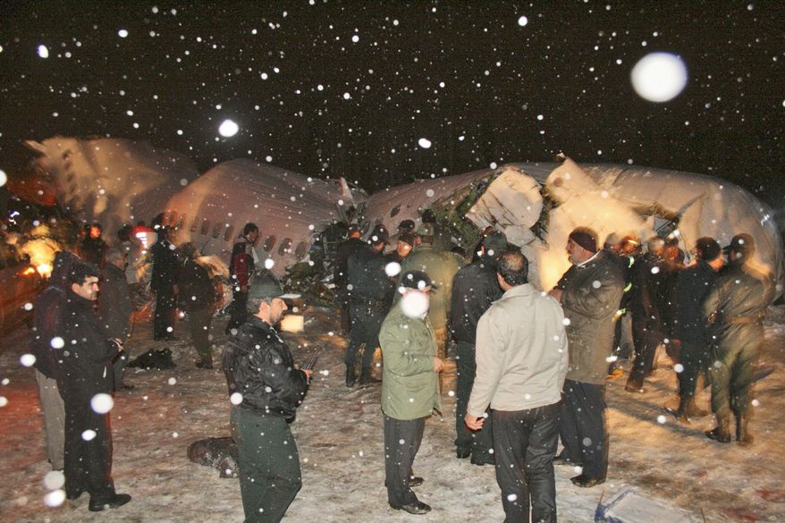 In this picture released by the official IRNA news agency, wreckage of the IranAir Boeing 727 passenger plane, which crashed Sunday after it was making an emergency landing, is seen outside the city of Orumiyeh, 460 miles northwest of Tehran. An IranAir passenger jet carrying 106 people crashed as it was making an emergency landing Sunday in a snowstorm in the country's northwest and broke into several pieces, killing more than 70 of those on board, Iranian media reported. The others survived with light injuries. (Associated Press/IRNA, Ali Asghar Shadjou)