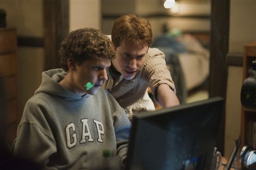 FILE - This undated publicity image released by Columbia Pictures shows Jesse Eisenberg, left, and Joseph Mazzello in a scene from the movie, "The Social Network." (AP Photo/Columbia Pictures, Merrick Morton) NO SALES