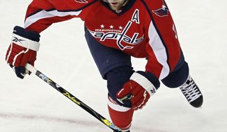 Washington Capitals defenseman Tom Poti failed his medical exam Friday and is expected to be placed on long-term injured reserve. (AP file photo/Manuel Balce Ceneta)