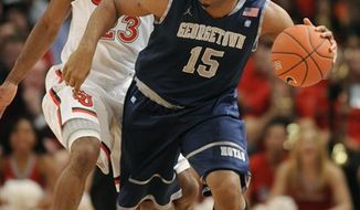 Former Georgetown basketball standout Austin Freeman faces seven traffic offenses, including driving under the influence of alcohol, from an incident less than 48 hours after he wasn&#39;t picked in the NBA draft, according to Hyattsville District Court records. (AP Photo/Henny Ray Abrams, File)